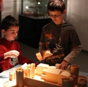 Children using the interactive castle at West Gallery Exhibition